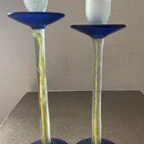 Duo of vintage Kosta Boda candlesticks in glass paste