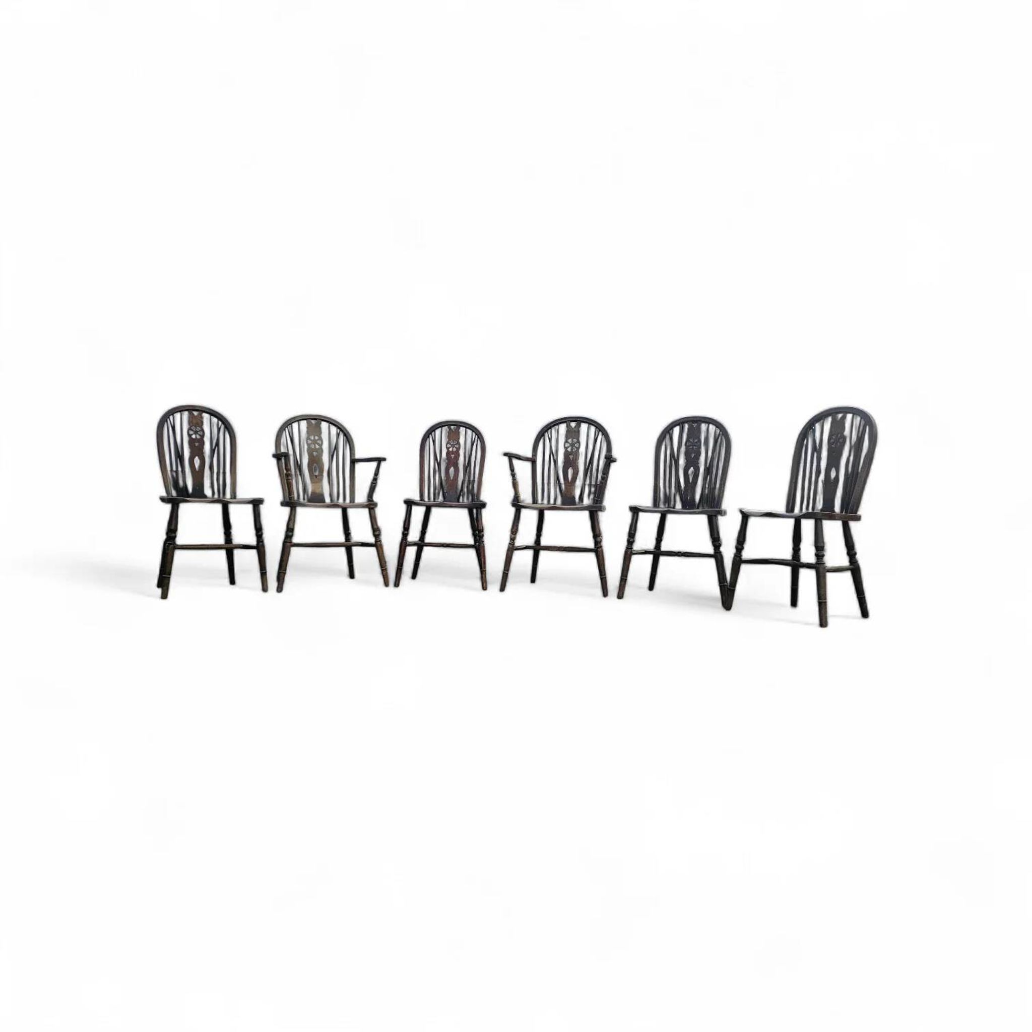 A slightly weathered Windsor wheelback dining set (7) by Oirschotse Meubelindustrie 1950s