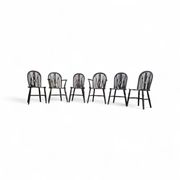 A slightly weathered Windsor wheelback dining set (7) by Oirschotse Meubelindustrie 1950s