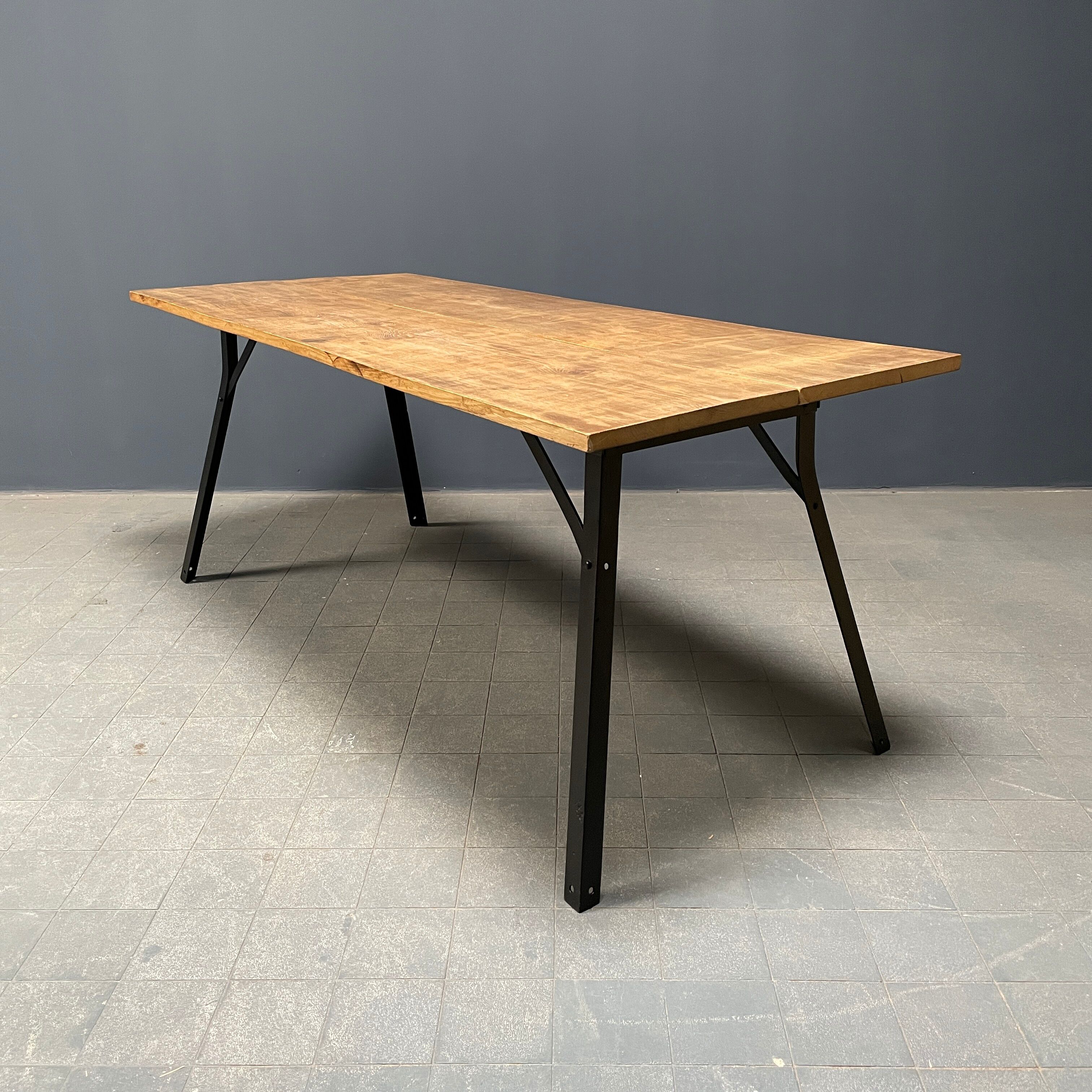 Handmade industrial oak dining table with black metal legs