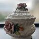 Capodimonte-style porcelain lidded sugar bowl with floral relief