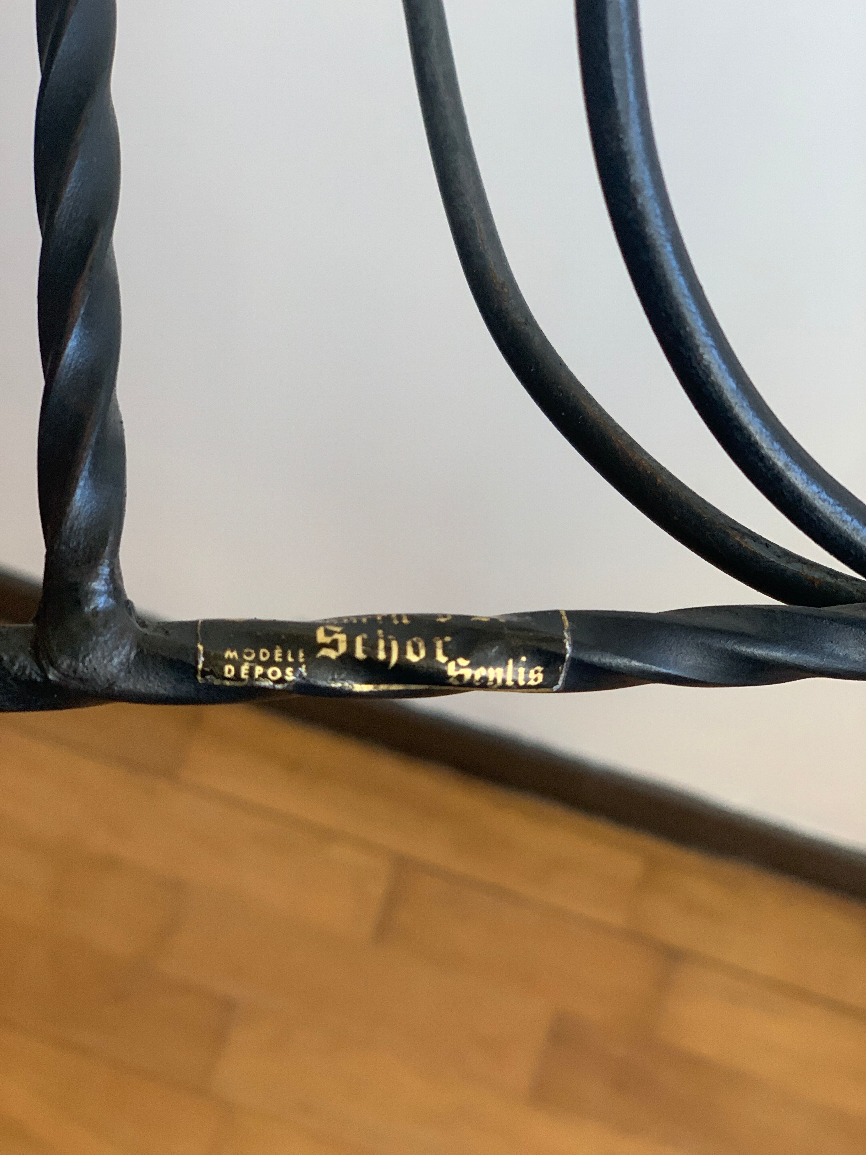 Wrought iron review door