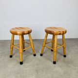 Pair of brutalist solid wood stools