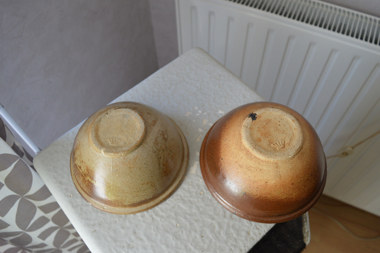 Two cups signed Pierre Digan