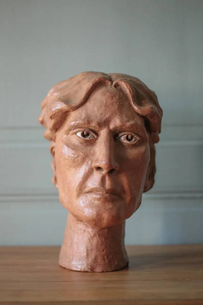 Sculpture signed Doloire, terracotta sculpture, sculpture of a man's head, collection, interior decoration.