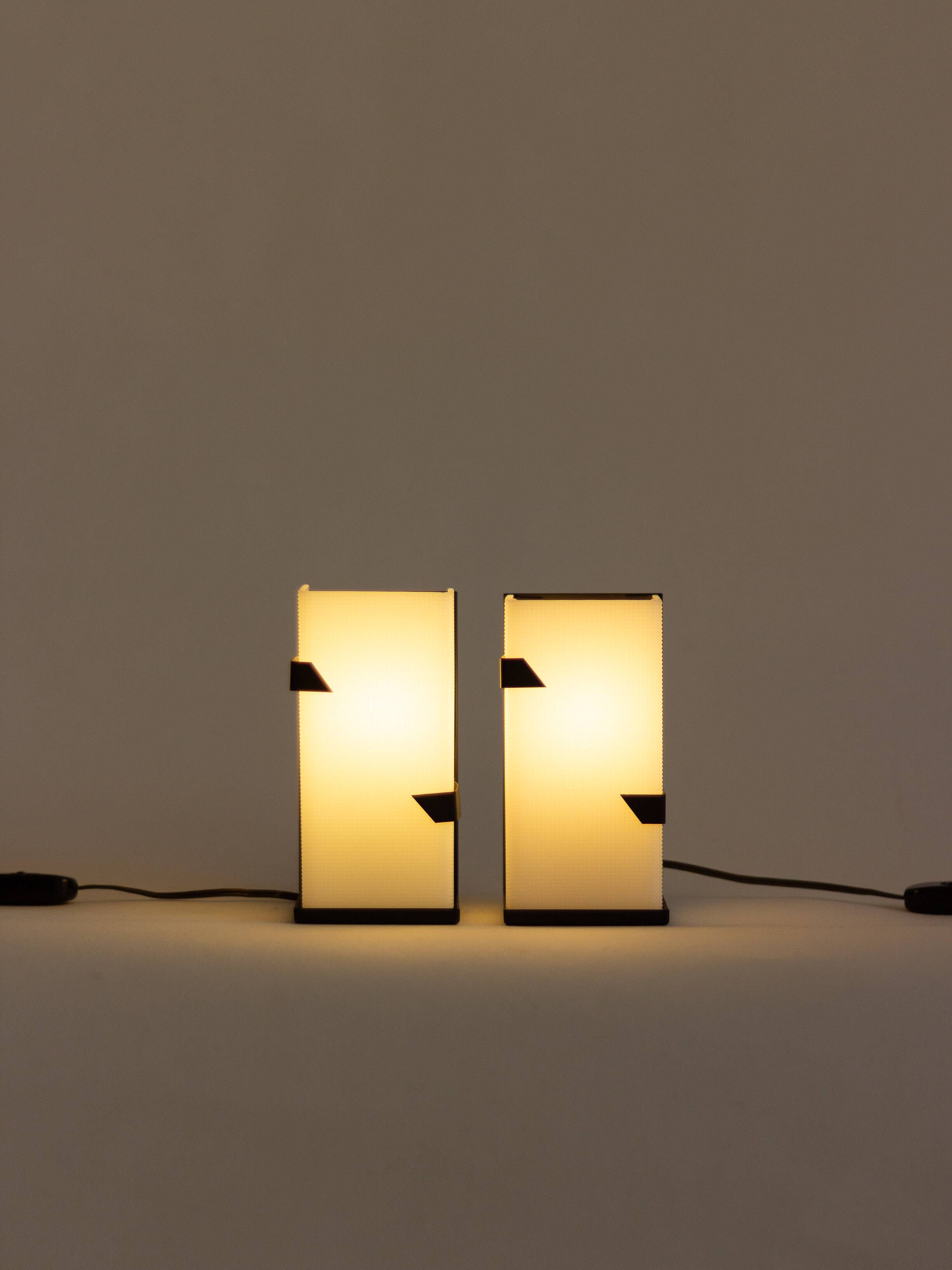 Pair of modernist metal wall lights with perspex diffuser, 1950s/1960s