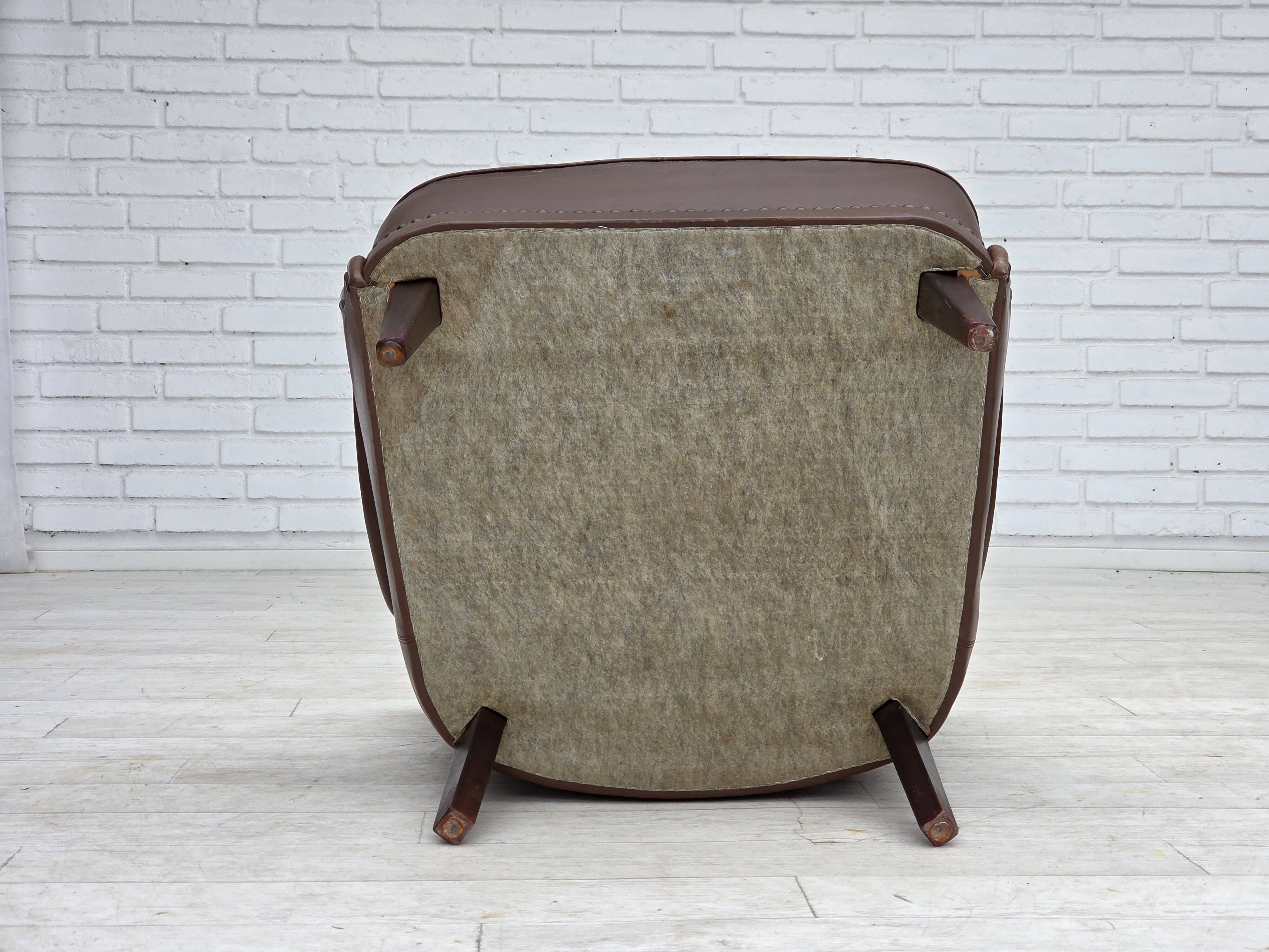 1960s, Danish armchair, furniture leather, ash wood legs.