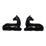 Black marble bookends with lying horses