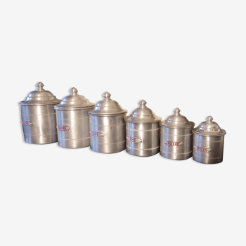 Series of six antique aluminum pots