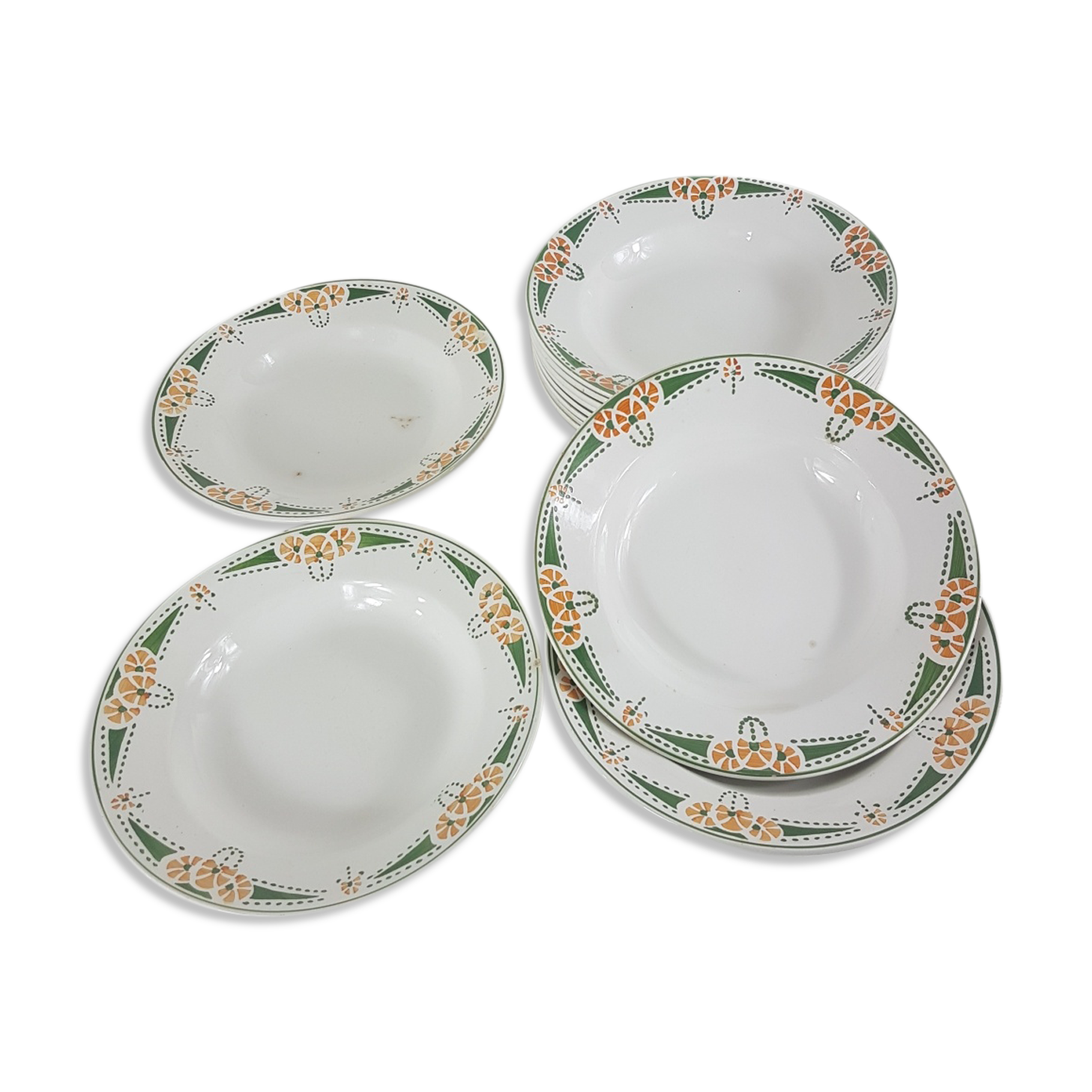 12 hollow plates made of Longwy earthenware