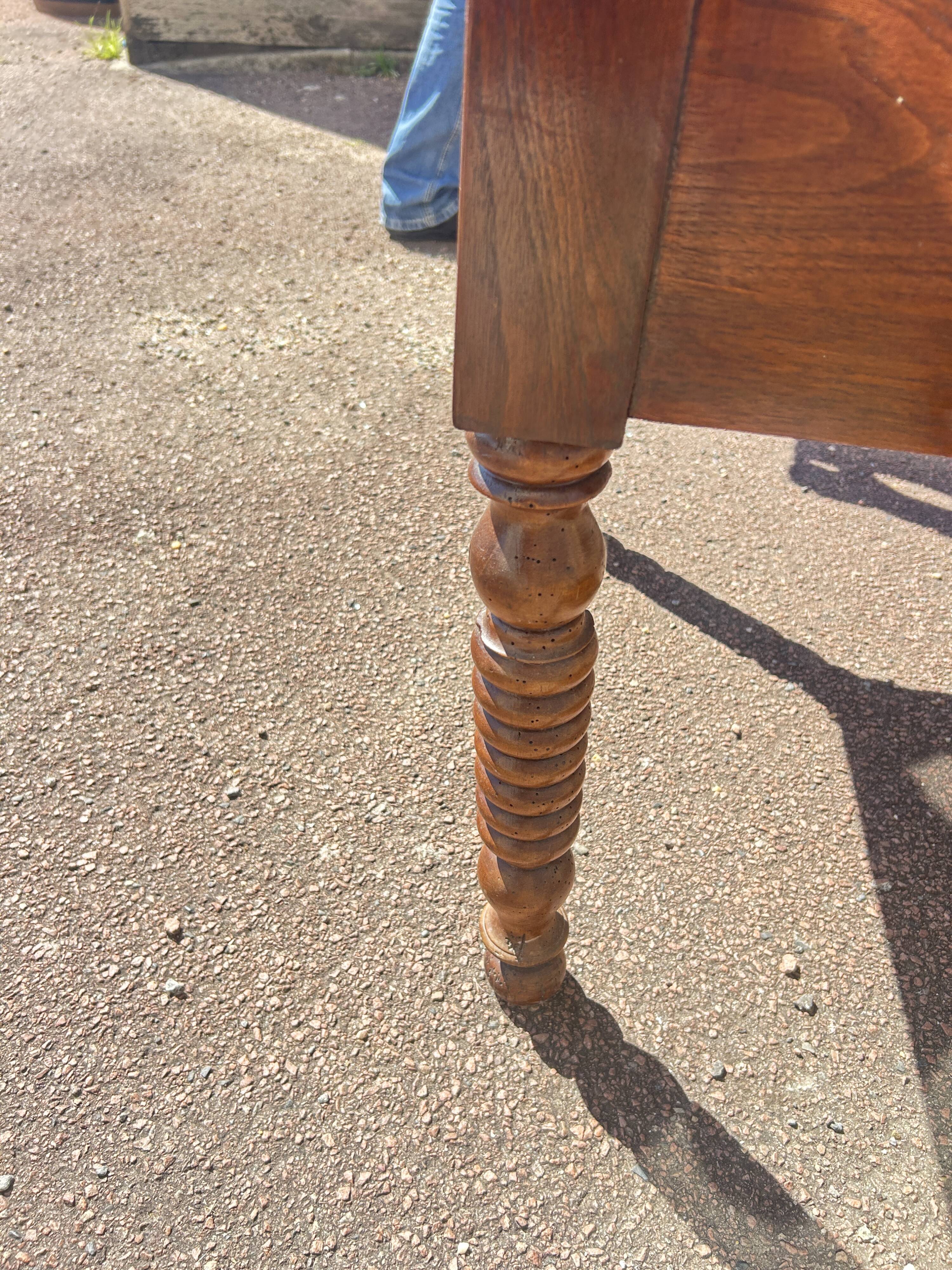 Louis Philippe desk in walnut, with a leather top.