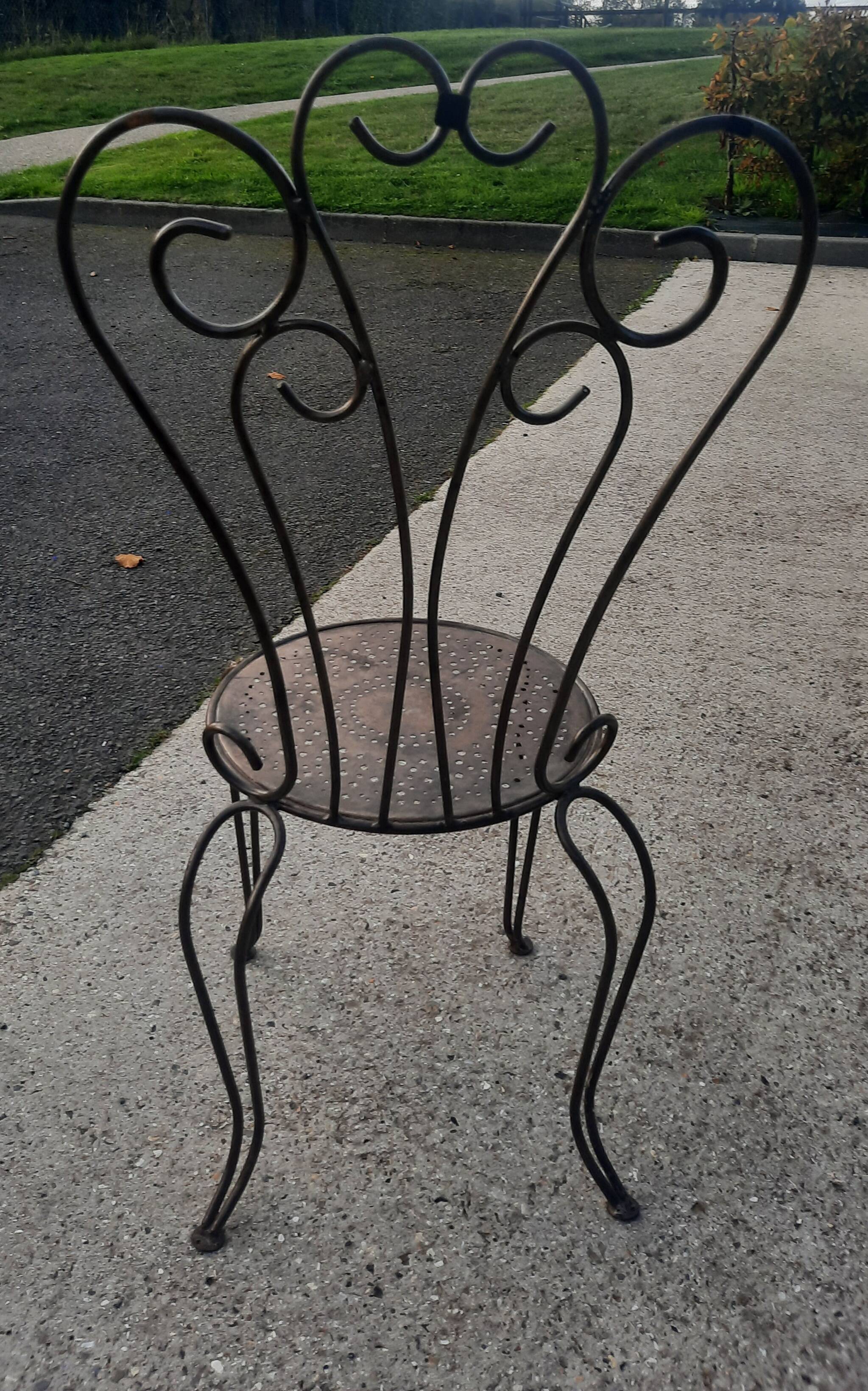 Bent metal chair