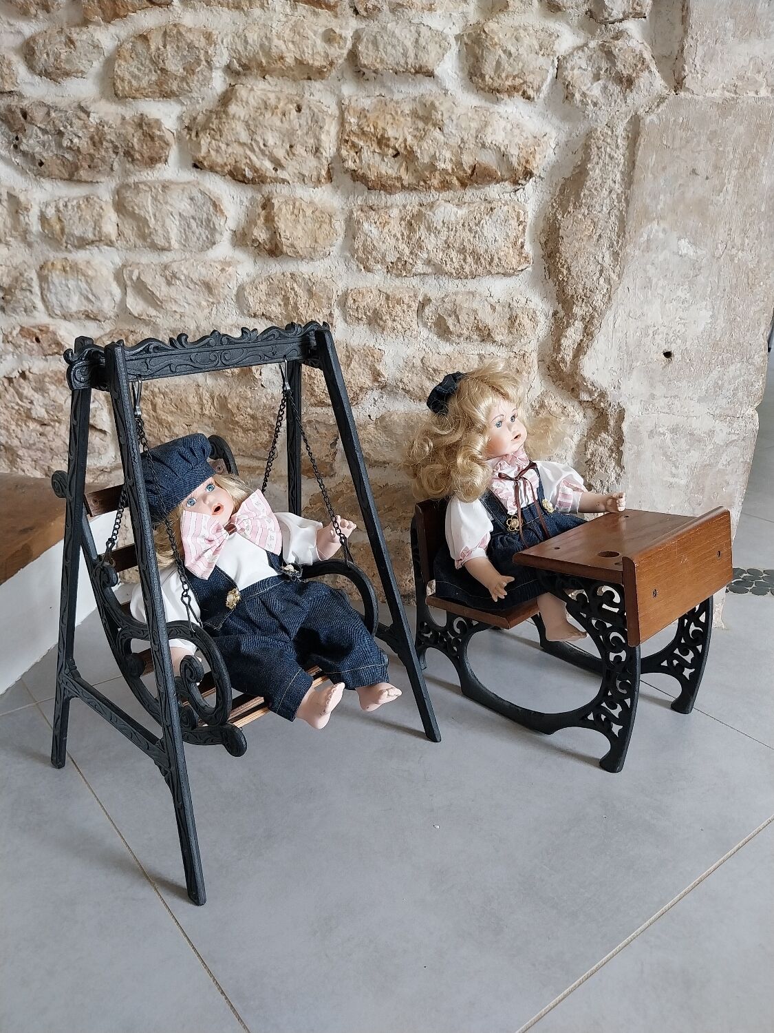 Wooden swing desk and porcelain dolls
