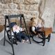 Wooden swing desk and porcelain dolls