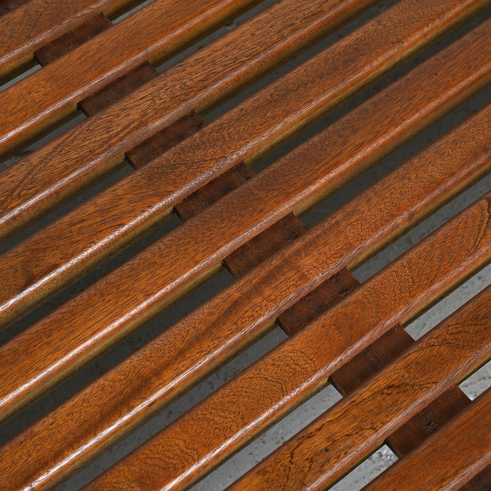 Cansado mahogany bench by Charlotte Perriand, circa 1962.