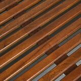 Cansado mahogany bench by Charlotte Perriand, circa 1962.