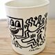 Pair of Keith Haring pots in opaline.