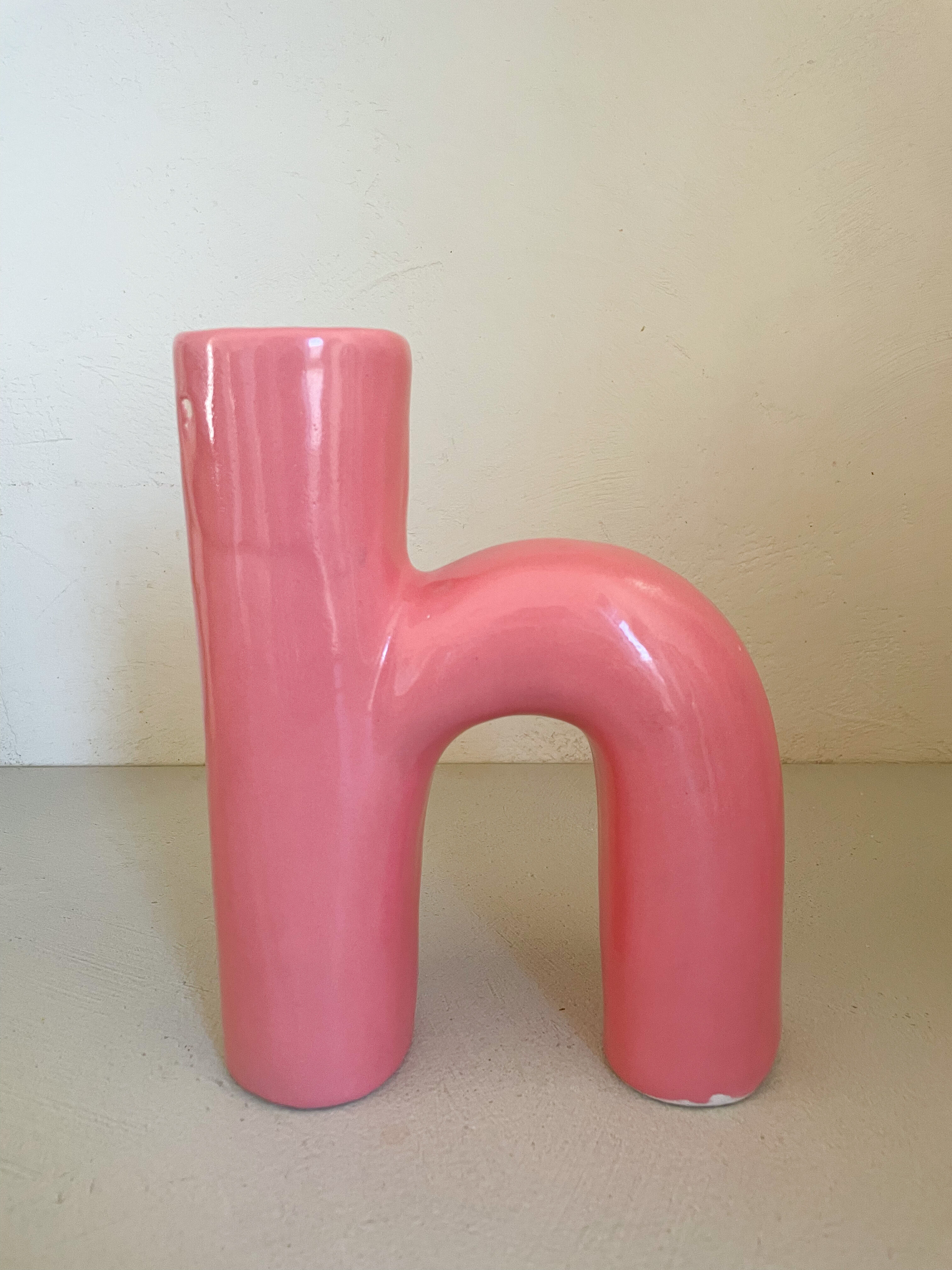 Abstract vase in arched pink ceramic
