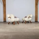 Early pair of arnold madsen clam chairs in curly sheepskin, madsen & schubell, 1944