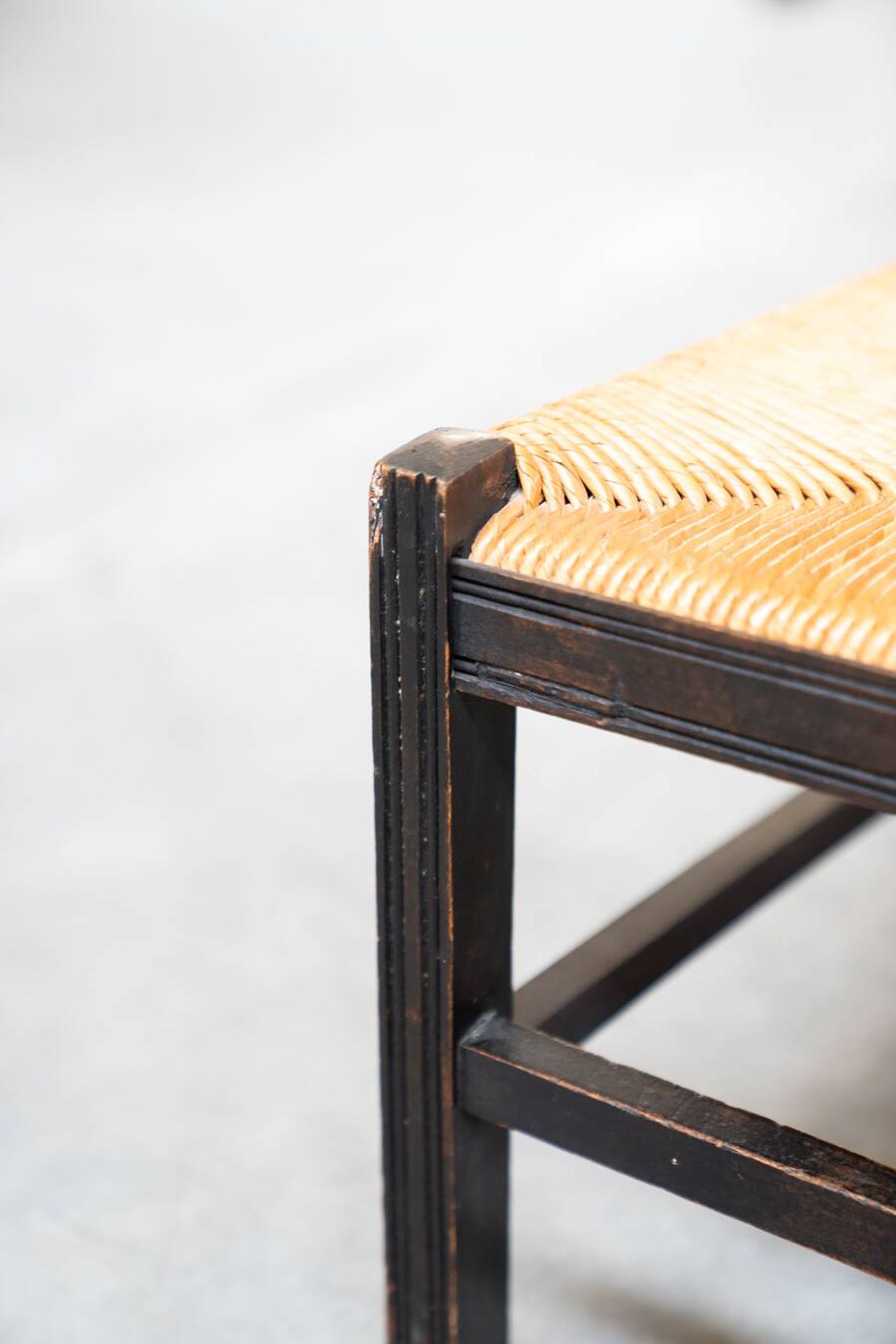 2 low bedroom chairs in hand-woven rice straw, 1950s/1960s