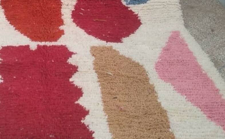 Magnificent handmade Berber rug, adorned with colourful geometric patterns.