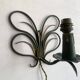 Pair of wall lights in patinated green painted iron, 1950s