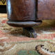 Mahogany pedestal table with marble top veneer
