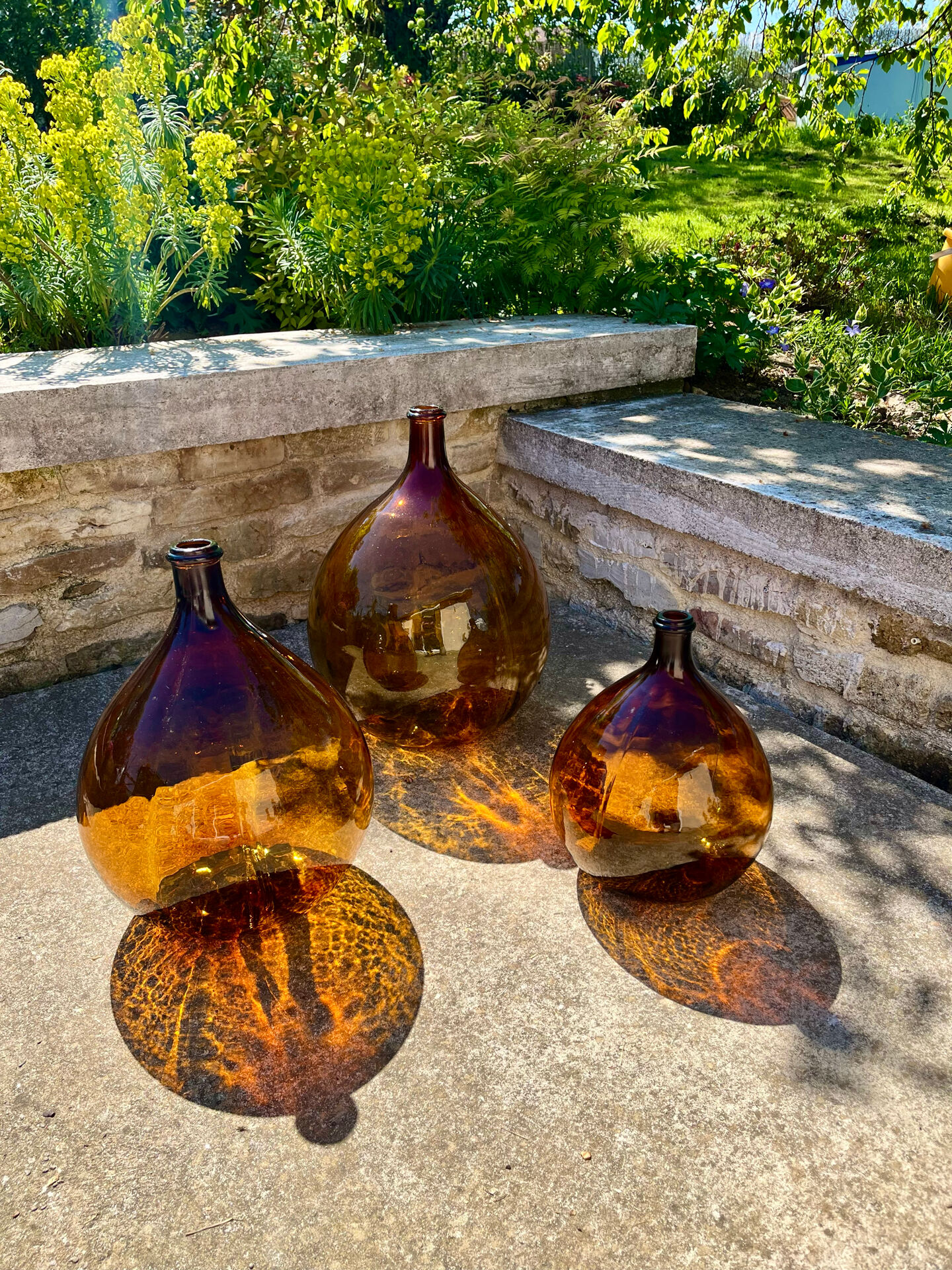 Lot de 3 dame-jeanne ambrées
