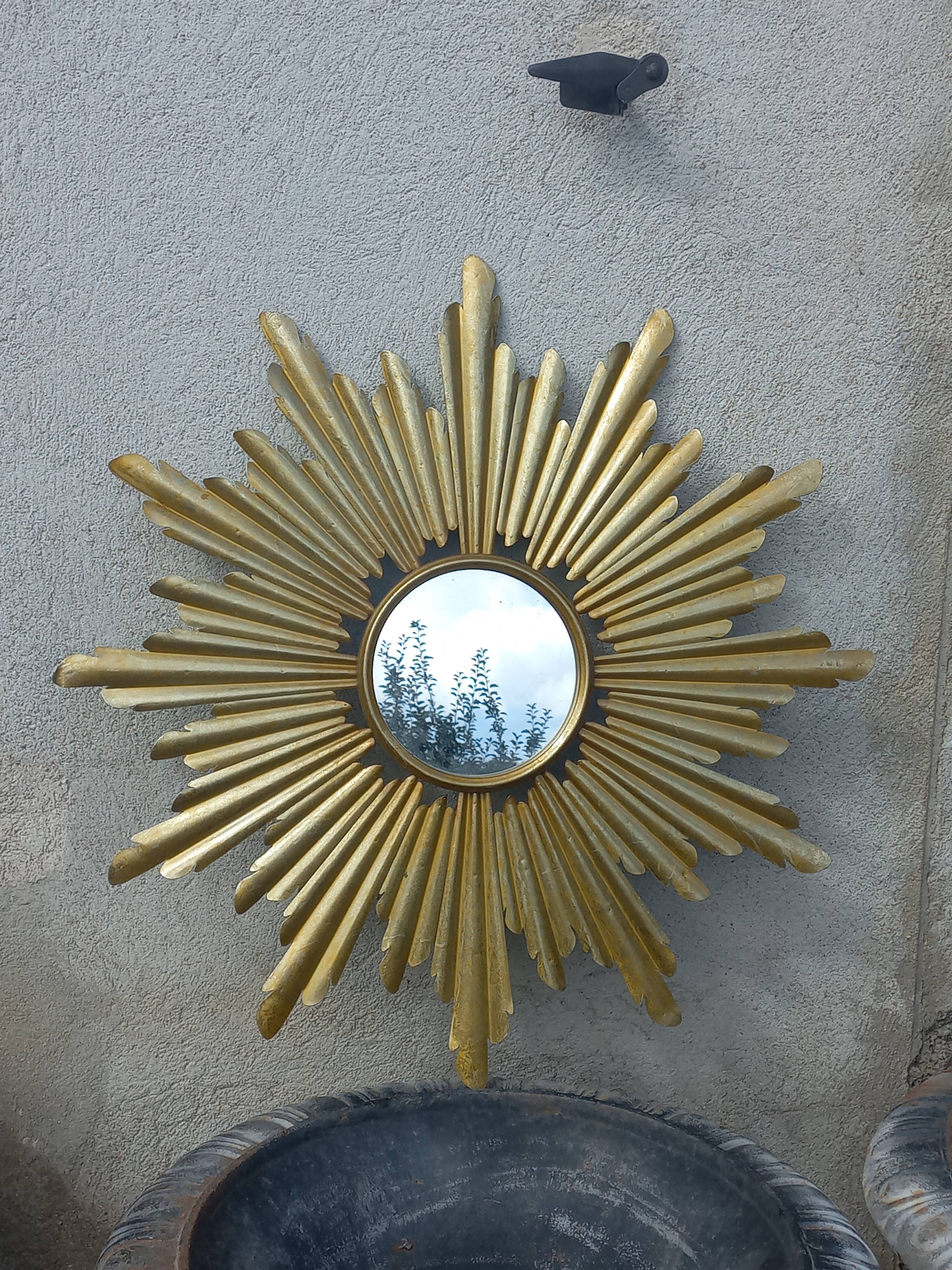 Gold metal sun mirror