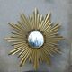 Gold metal sun mirror