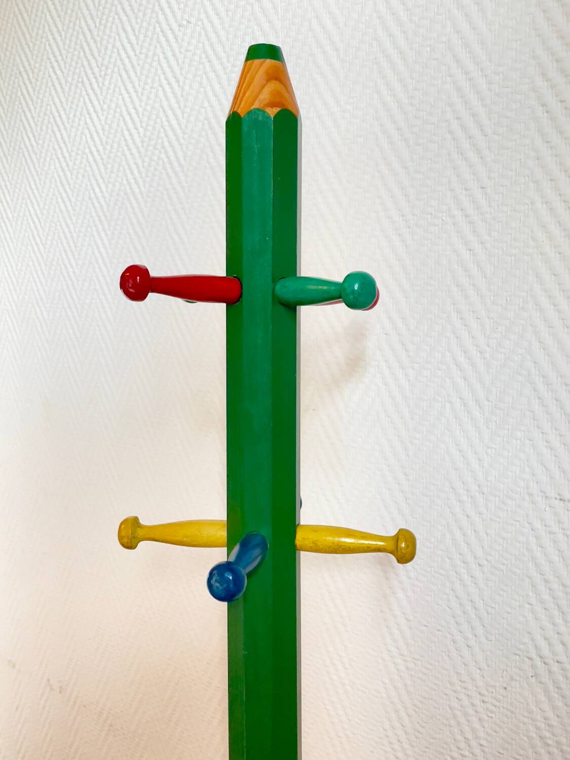 Pencil coat rack for children by Pierre Sala.