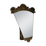 Antique wooden mirror with an unusual shape