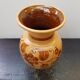 Beige ceramic vase with vintage brown flower decor
