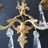 Pair of gilded bronze sconces and crystal pendants