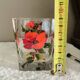 Unique whisky glass with a poppy design, handmade and signed by M.B.