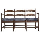 Sofa / Sculptural Danish modern three-seater Scandinavian bench, made by Hans Dau, 1950s.