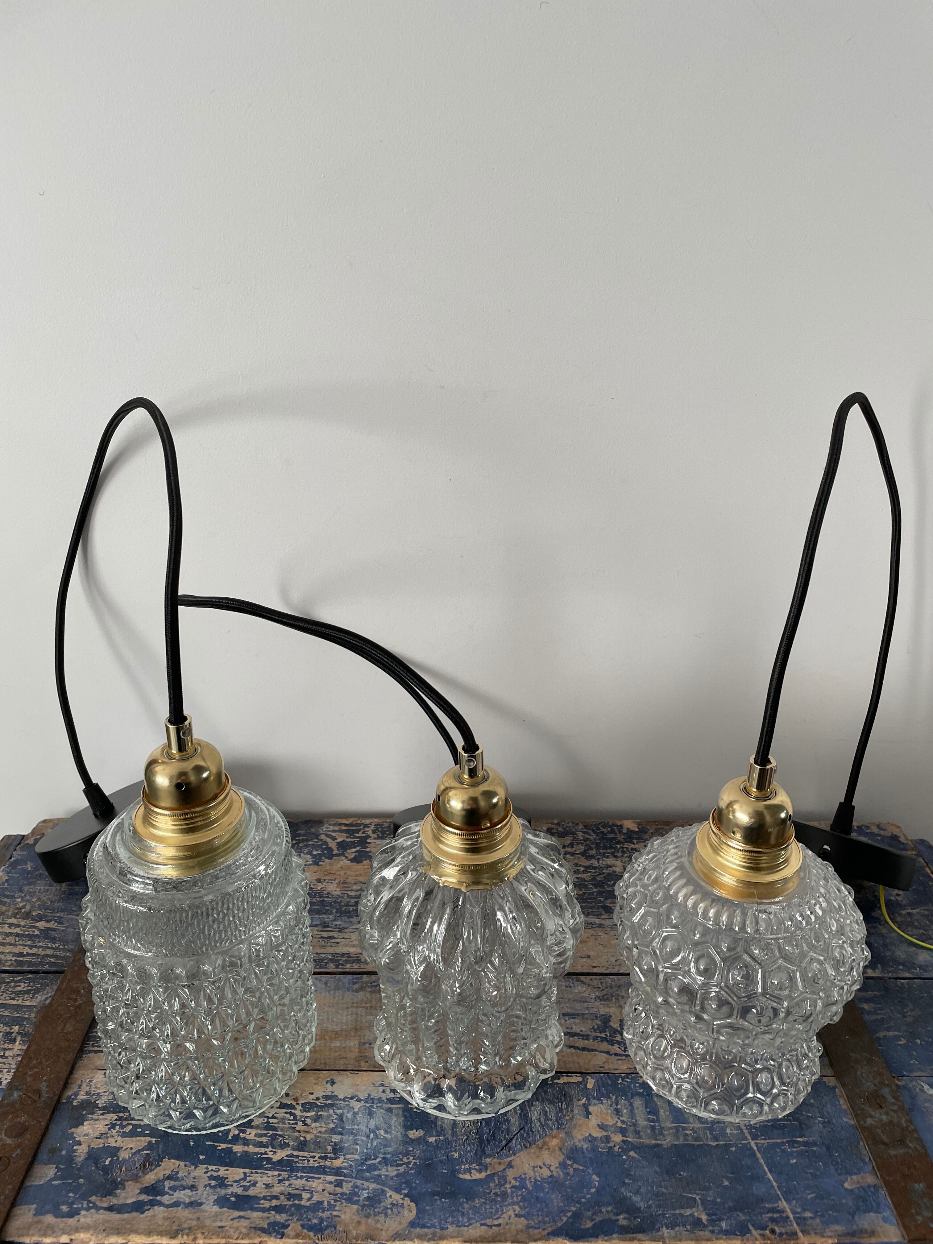 Set of three vintage electrified glass pendant lamps