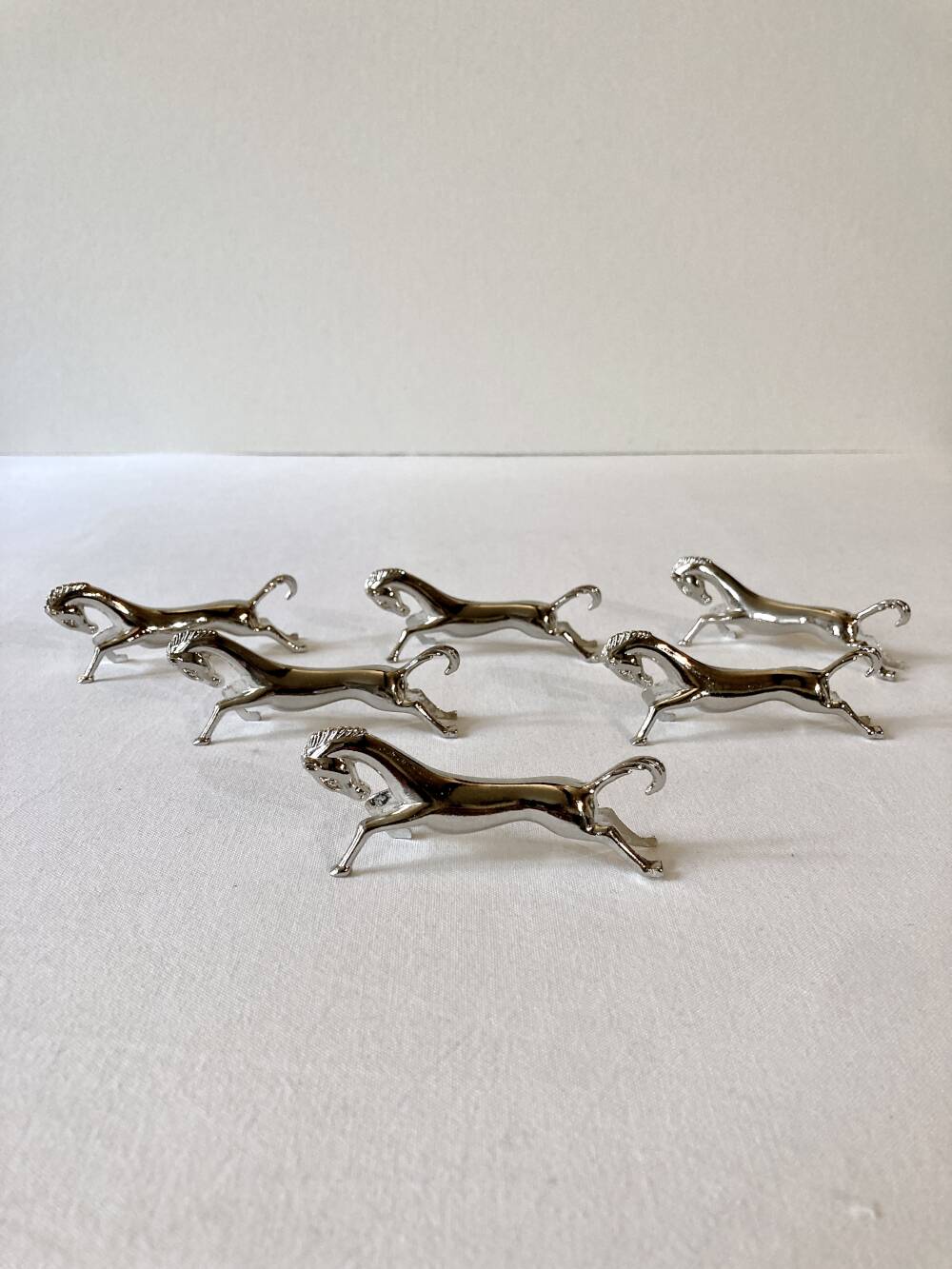 6 silver-plated knife rests in the shape of a horse. 1960s.