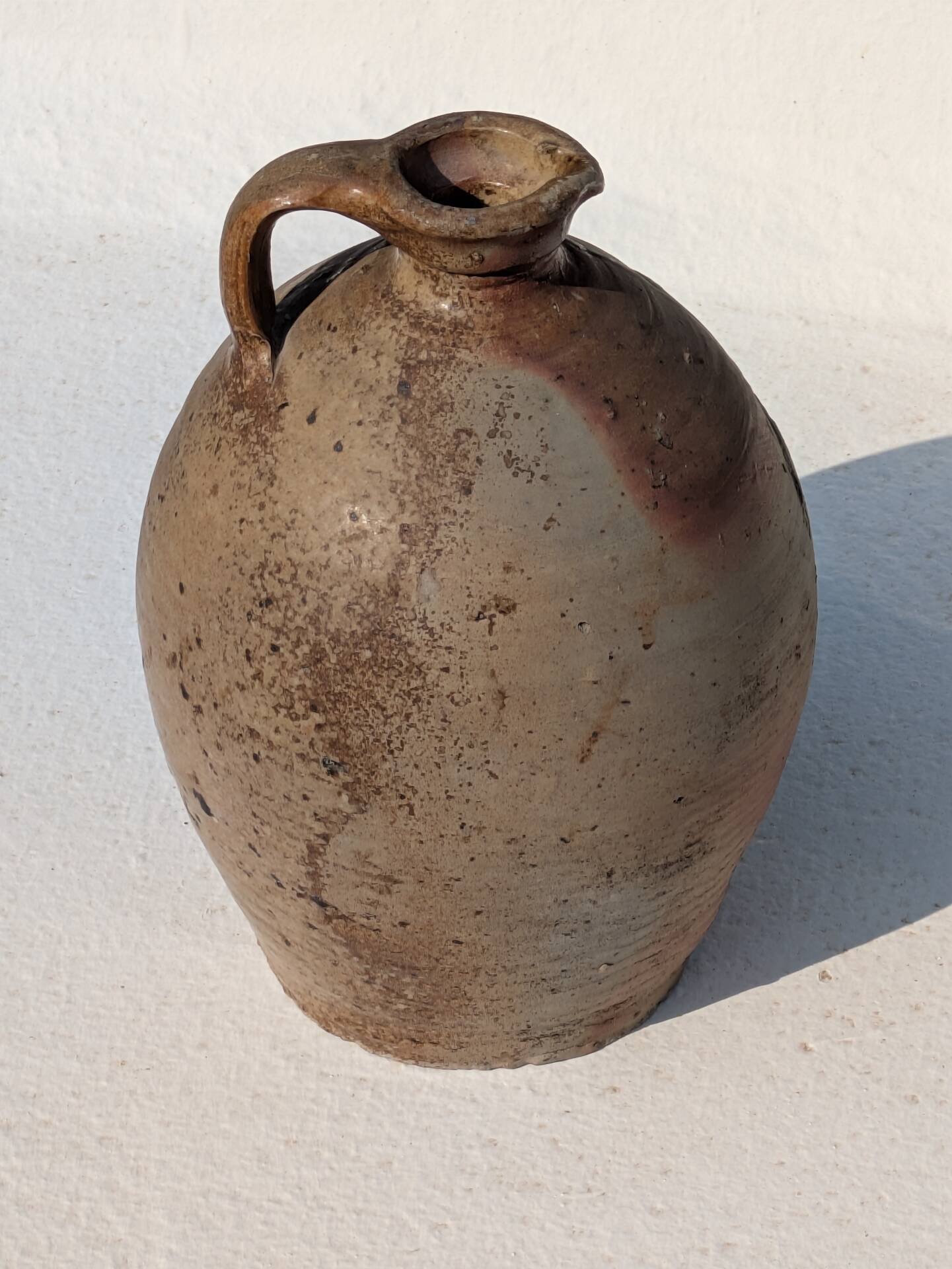 Very beautiful stoneware jug from the 19th century.