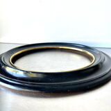 Black wooden oval frame