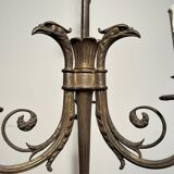 Empire-style bronze chandelier with 3 arms of light topped with eagle heads. French work. Circa 1900.