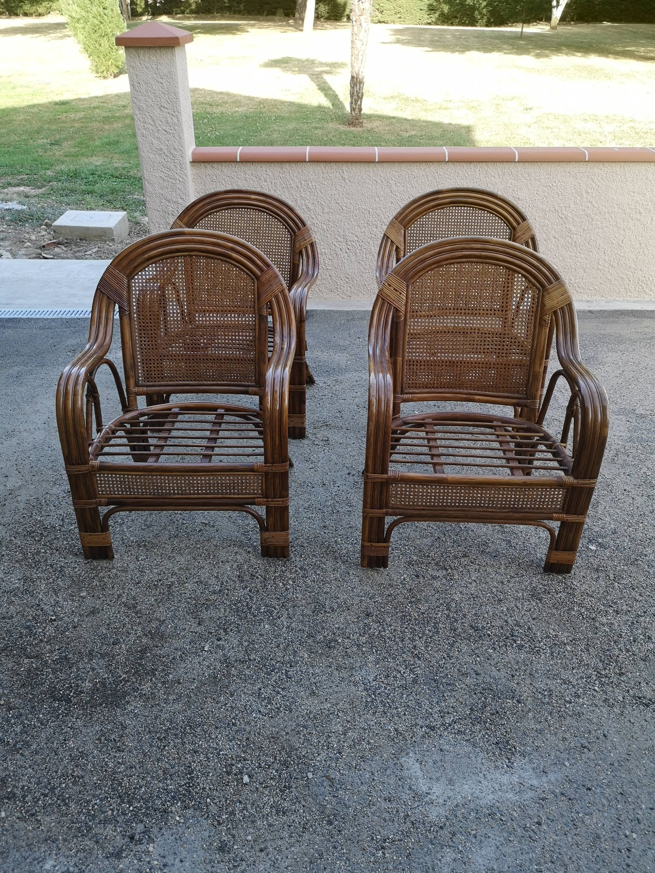 4 vintage rattan armchairs