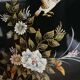 Buffet of black and gold laqué Chinese storage with relief subjects decorated flowers painted birds
