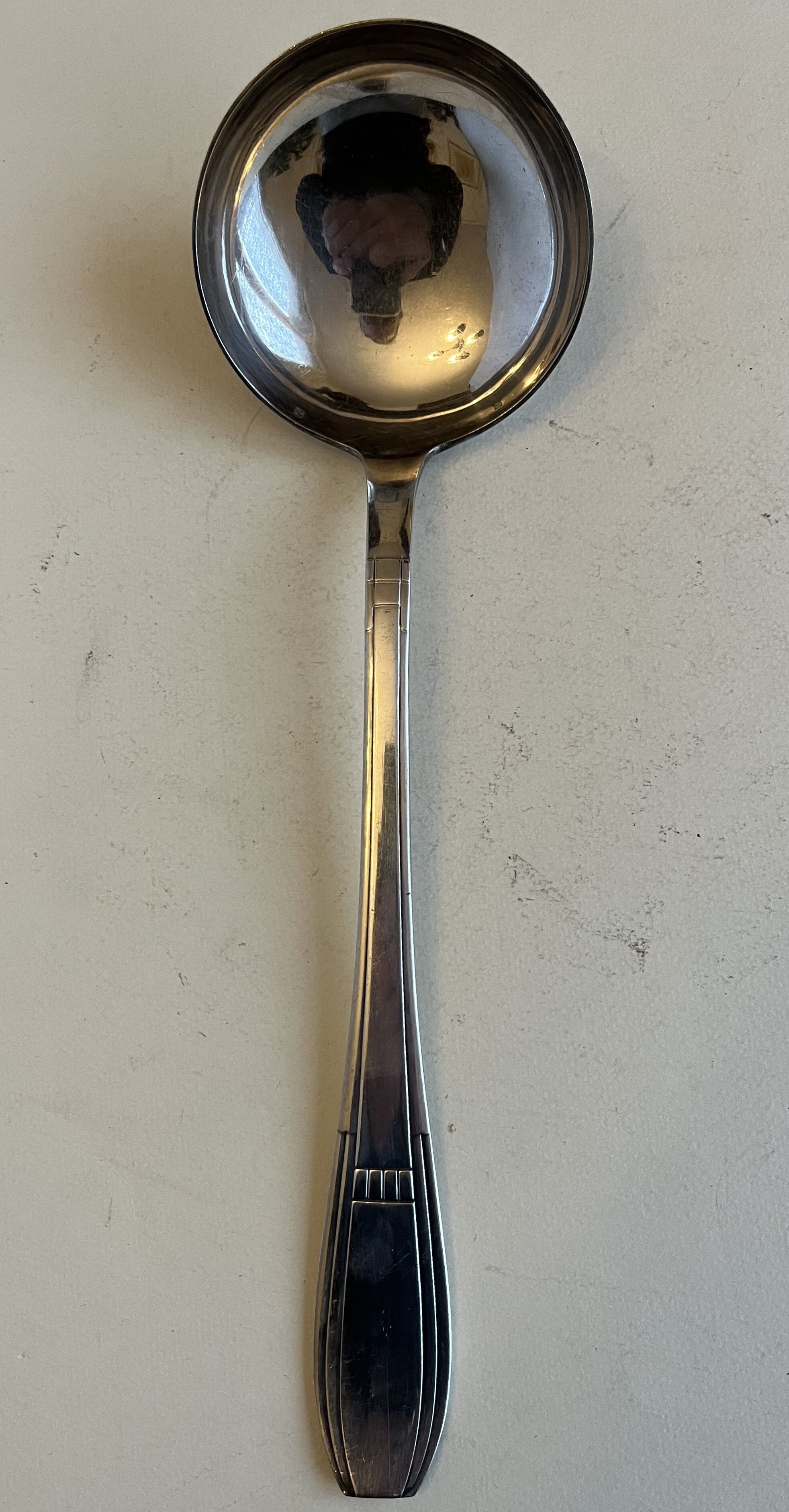 Silver metal ladle