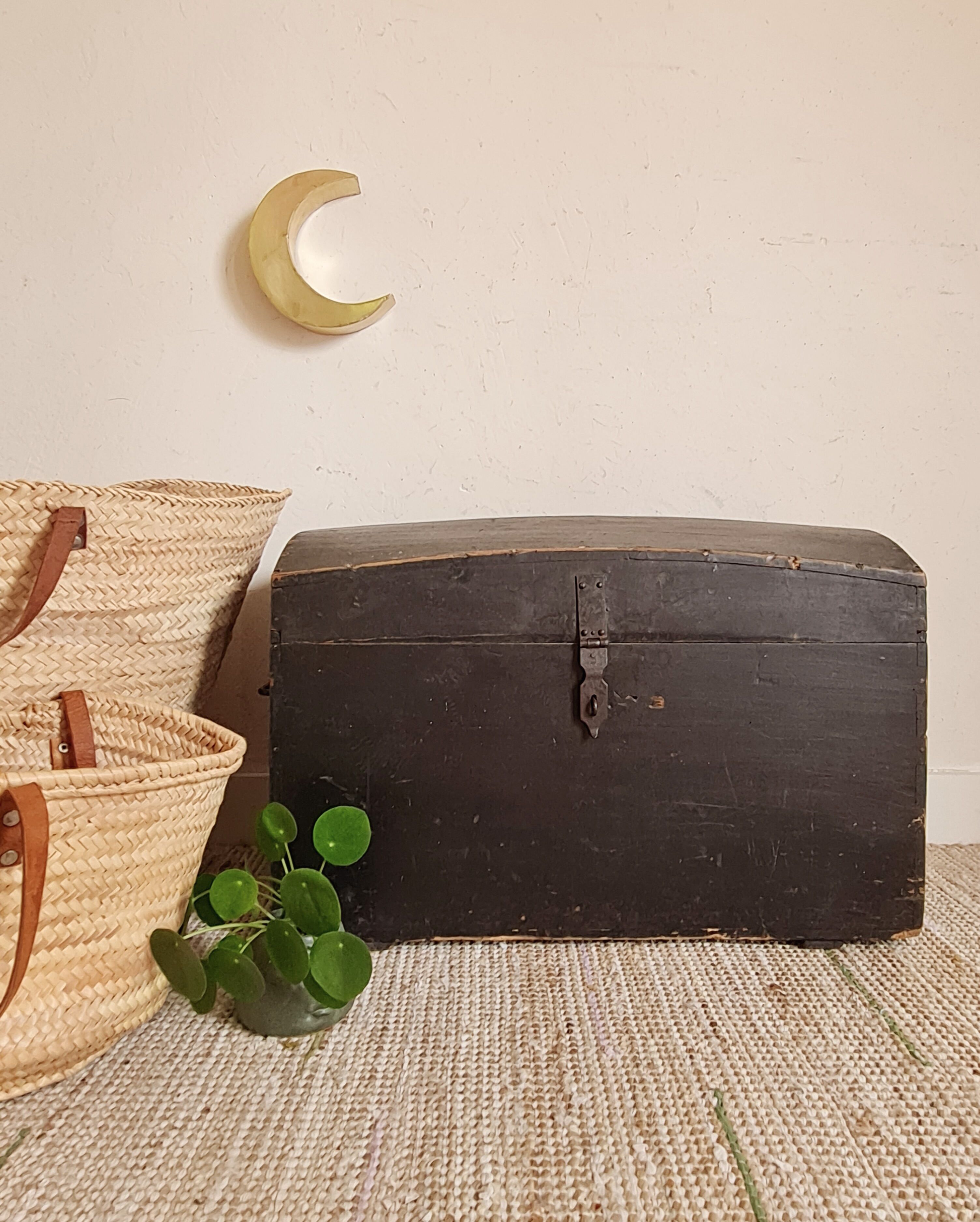 Old chest in black wood