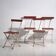Antique red folding garden chairs (circa 1920). Set of 4 pieces