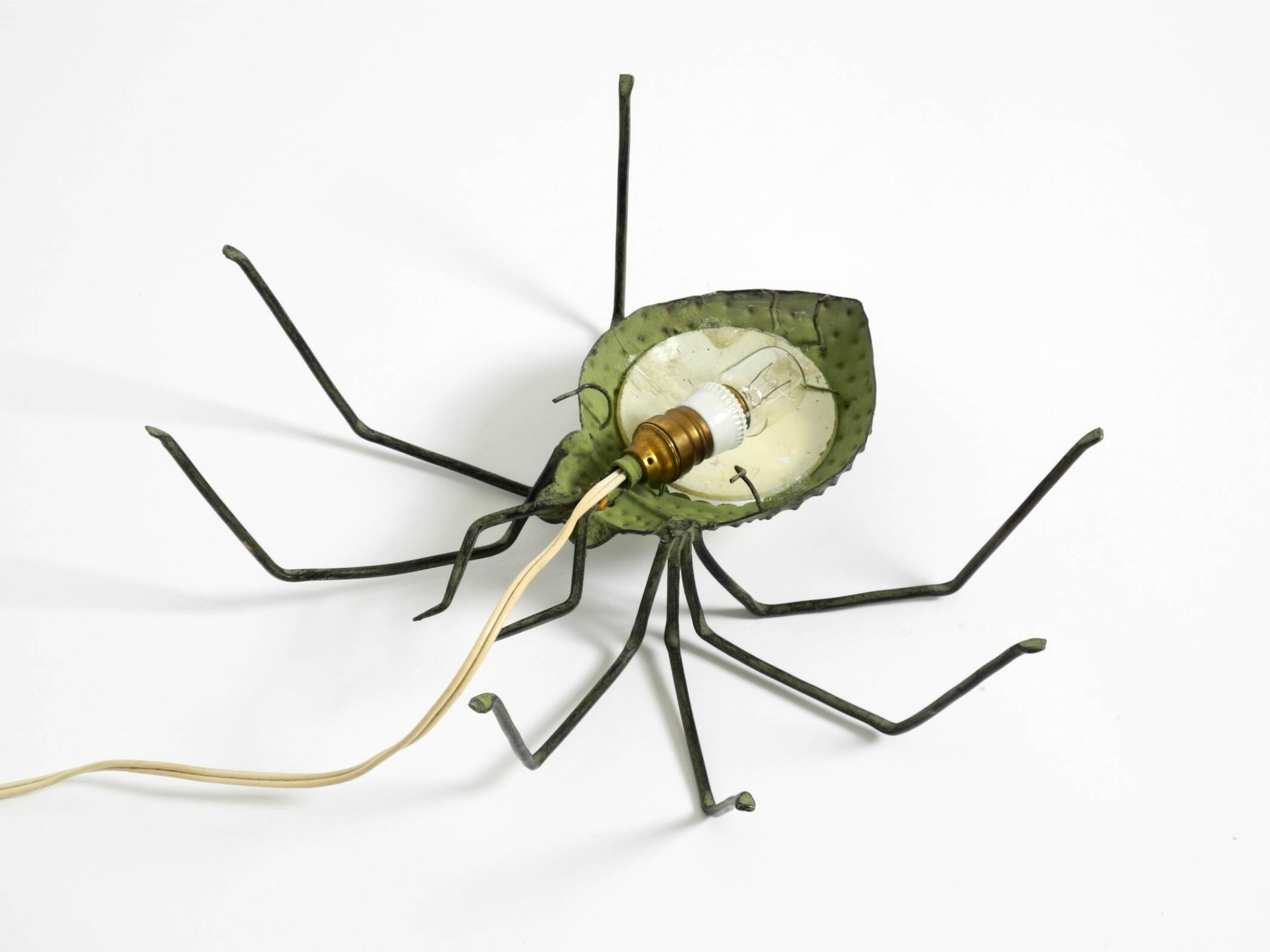 Beautiful Italian Mid Century Modern "Spider" wall lamp made of metal