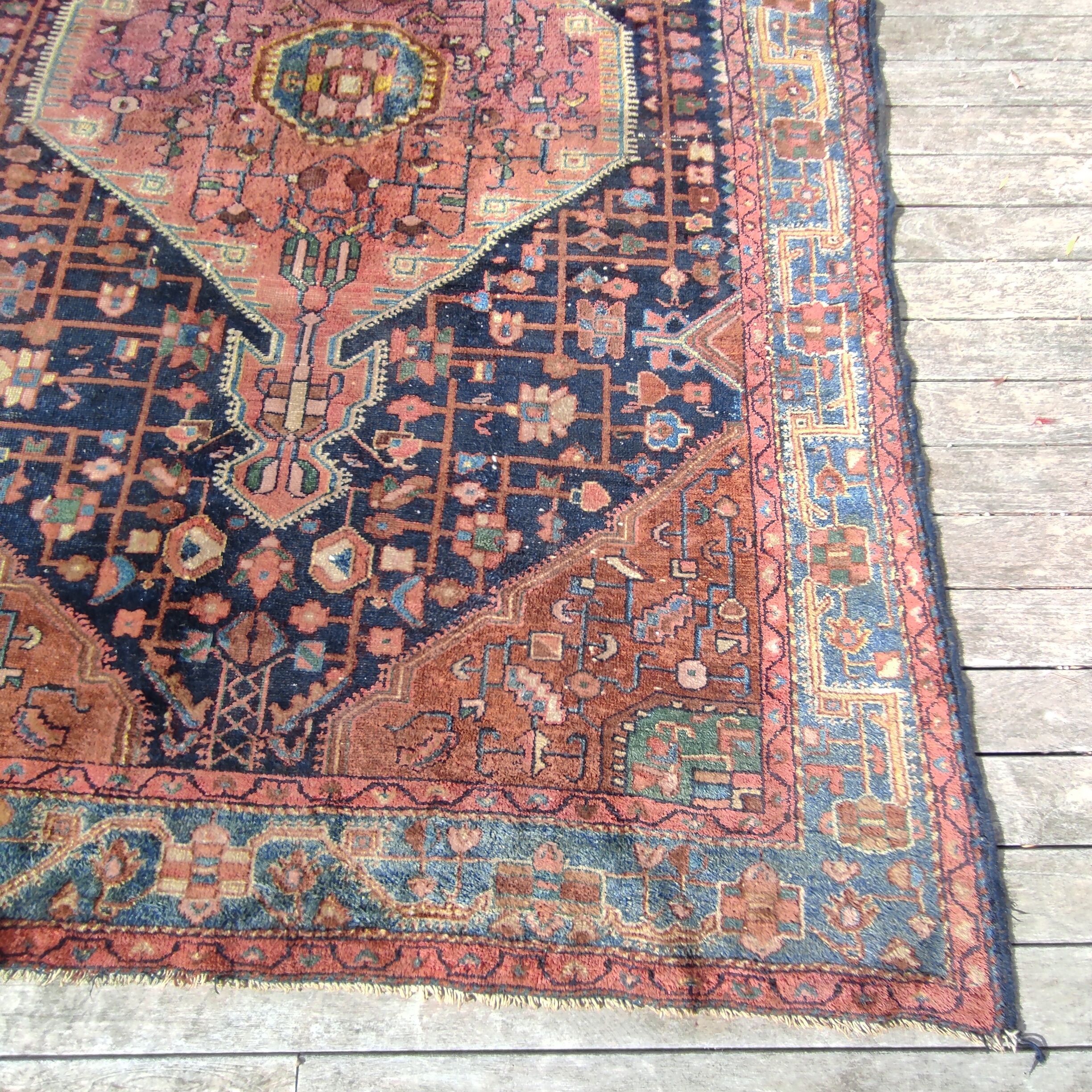 Old Persian carpet 1.62 m wide and 2.33 meters long