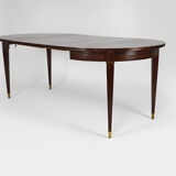 Art Deco mahogany round table by Jacques Adnet, circa 1940