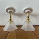 Pair of wall sconces with vintage globes